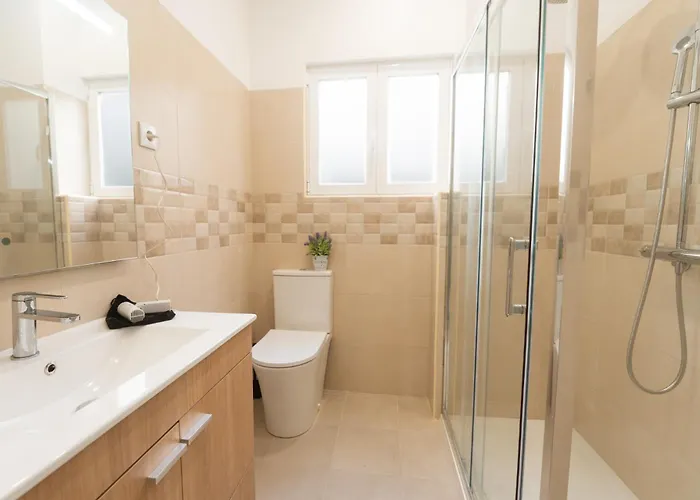 Апартаменты Alfarrobeira House Кашкайш